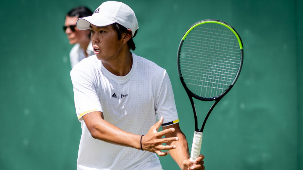 Learner Tien competes at the Wimbledon Championships