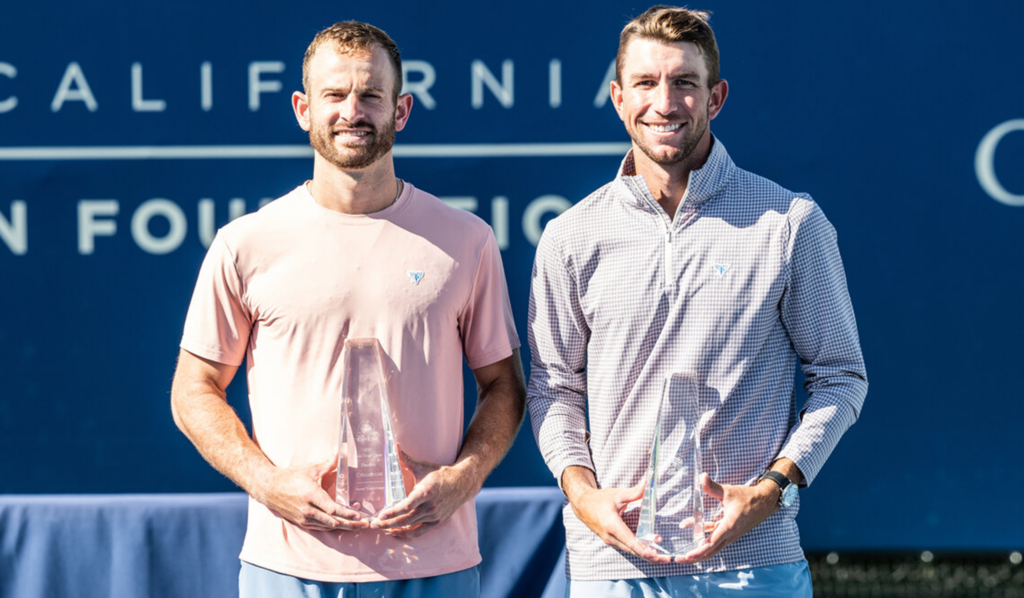 Nathaniel Lammons and doubles partner Jack Withrow hold their championship trophy at the ATP San Diego Open. 